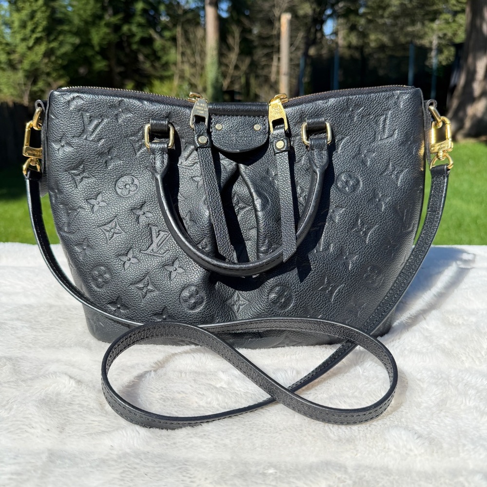 Louis Vuitton Mazarine crossbody bag